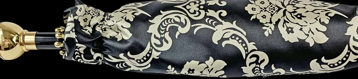 Black double canopy umbrella with damask design