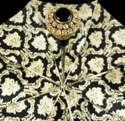 Black double canopy umbrella with damask design