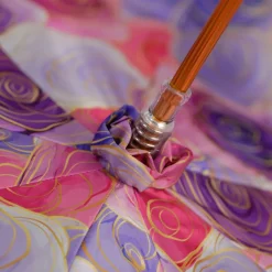 Blushing Elegance: Pink Umbrella with Delicate Floral Accents