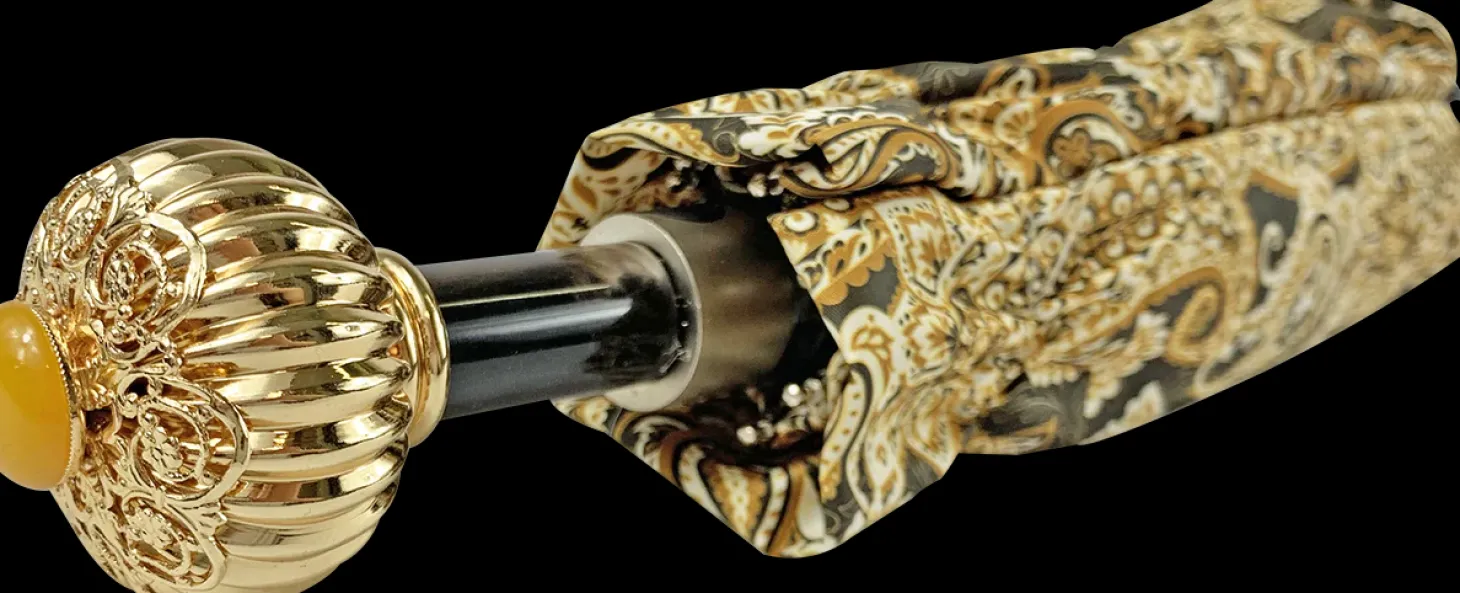 Cream paisley design with yellow stone