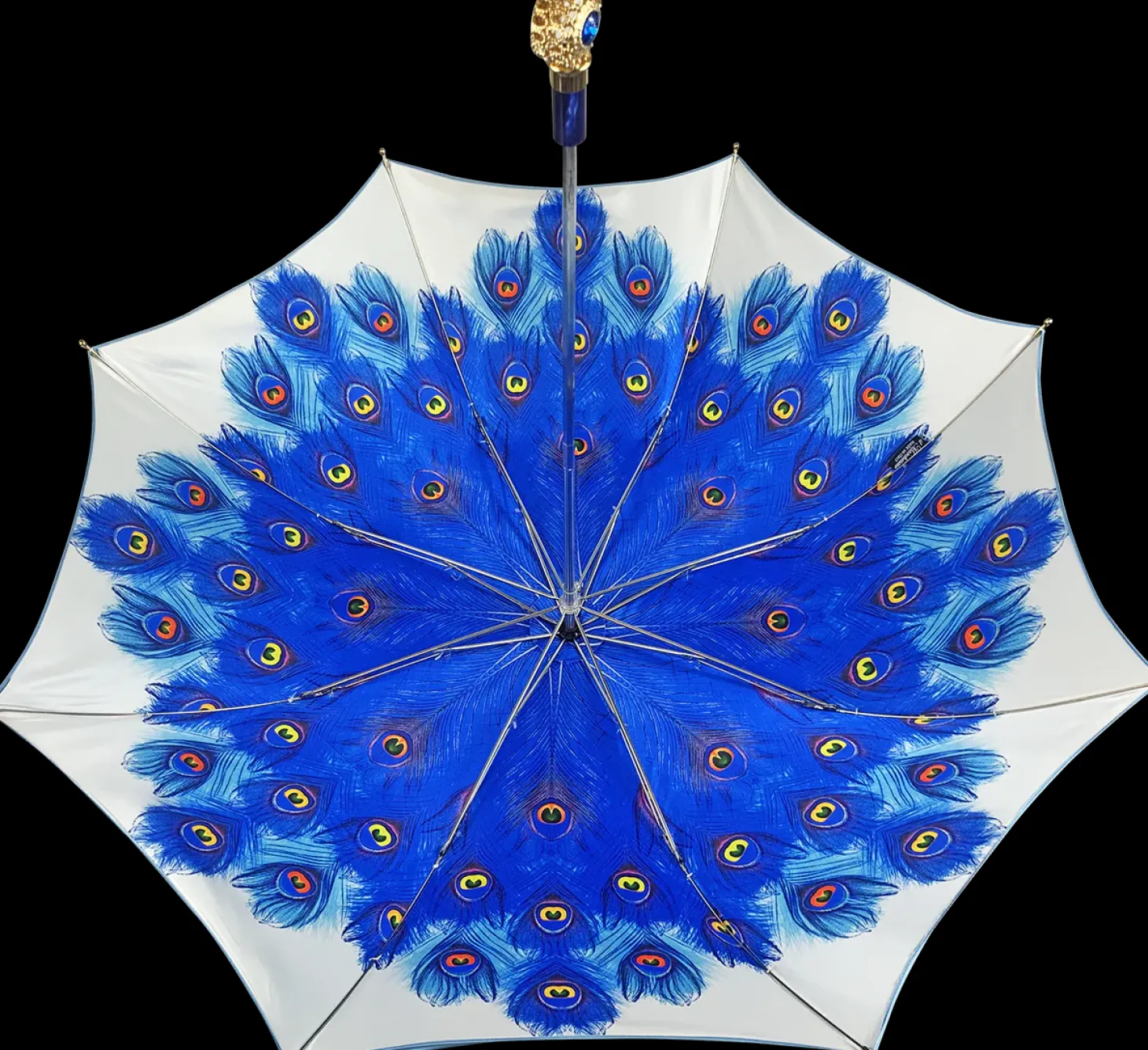 Exclusive peacock design with Sapphire crystals